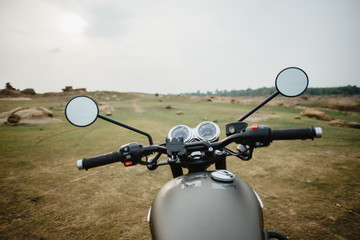 The view over the handlebars of motorcycle