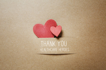 Thank You Healthcare Heroes message with handmade small paper hearts