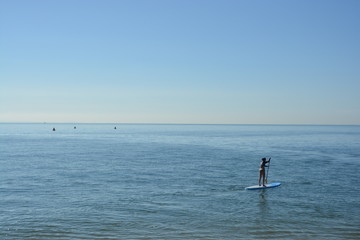 Calm ocean, paddle board