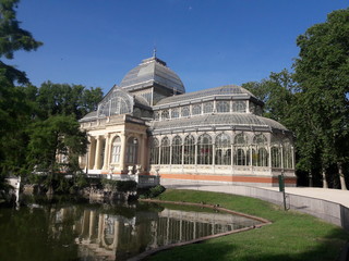 Fototapeta na wymiar The Glass Palace = Palacio de Cristal - conservatory in Buen Retiro Park Madrid Spain