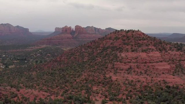 Red rocks of Sedona, Cathedral rock in background, aerial drone 