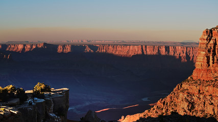 Grand Canyon national park with sun casting shadows onto valley floor colorado river at sunrise...