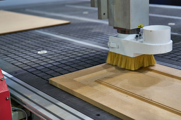 Processing of panels on the coordinate-milling woodworking machine with CNC.