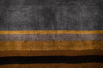 Black and yellow carpet textures with short hairs fiber for background, natural textile