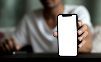 Man holding smartphone with white screen and using smartphone background during stay at home