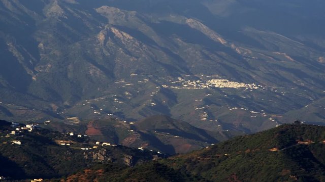 WS PAN Panning shot across Axarquia valley to Comares village