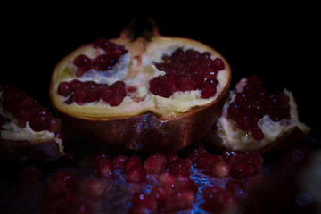 pomegranate on black