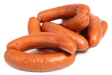 Smoked sausages isolated on a white background