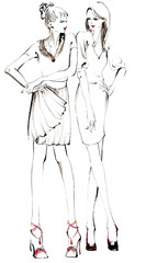 立っている二人の若く魅力的な女性