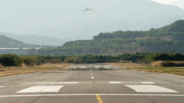 WS TS Twin engine business aircraft performing touch and go landing