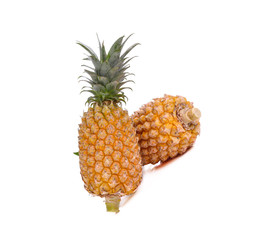 Two fresh pineapples isolated on white background