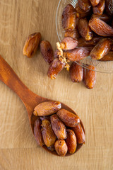 Kurma or dates on wooden background