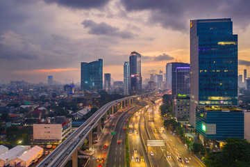 Naklejka na ściany i meble Jakarta skyline at dusk during coronavirus