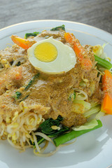 Pecel or pecel sayur, indonesian traditional food made from various boiled vegetables such as carrots, bean sprouts, cabbage and other vegetables and then given with peanut sauce. healthy food