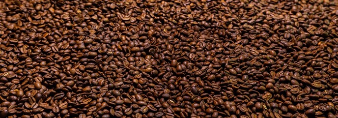Super large high resolution panorama macro photography of a huge heap of coffee beans. Close up to...