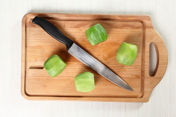 Peeled kiwifriut (kiwi). Directly Above.