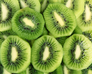 Background of kiwi slices (kiwifruit).