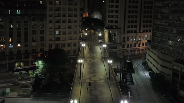 Aerial view of Santa Efigenia viaduct at night with no one in the street, at night, Sao Paulo downtown, Brazil