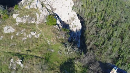 multiple Christian crucifix cross on mountain top cliff . Aerial. Croatia - Powered by Adobe