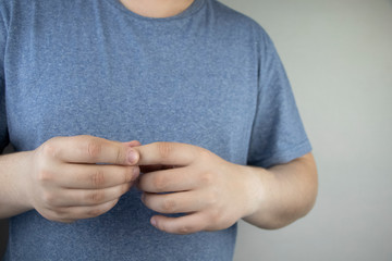 A man grows fingers that hurt and pull. Arthritis or arthrosis of the joints and its treatment....