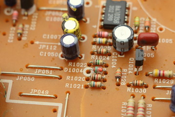 Microcircuit with radio parts close-up. Modern electronic industry.