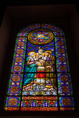 Stained glass window, Montserrat monastery on mountain in Barcelona, Catalonia.