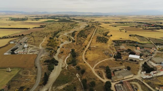 panning left aerial shoot of farm fields and the Oja River near the village of Santo Domingo de la Calzada