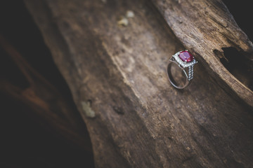 Elegant and beauty ring set on old wood background.Jewelry product photography.