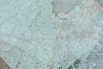 Broken car glass after an accident close up