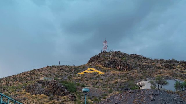 Time lapse of people hiking up A-Mountain in Tempe, Arizona.