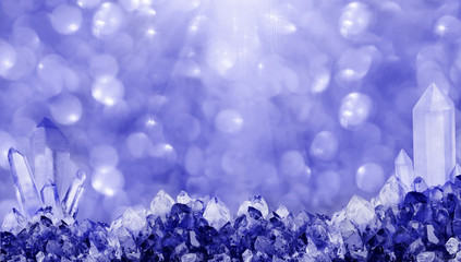 small and large sapphire crystals strip on bright background