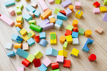 Colorful wooden building blocks. Selective focus