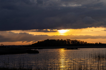 Sunset over Lake Kanieris in the spring evening.