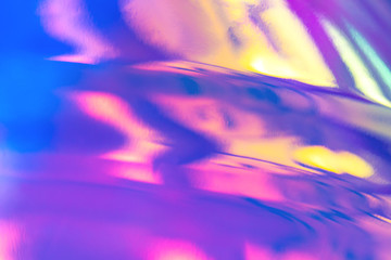 Blurred texture in violet, pink and mint colors. Abstract trendy holographic background in 80s...