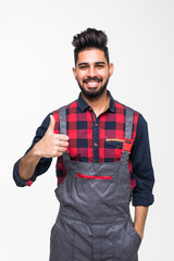 Fototapeta premium Smiling indian man worker thumbs up on white background