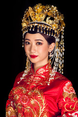 Portrait of wearing ancient Asian woman costume in black background
