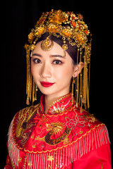 Portrait of wearing ancient Asian woman costume in black background