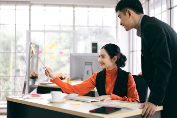 Adult asian business people work together.