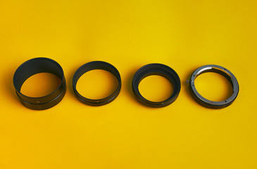 kit of macro rings isolated on colorfull orange background