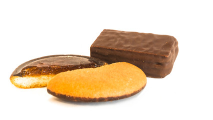 Cookies and a chocolate candy isolated on a white background