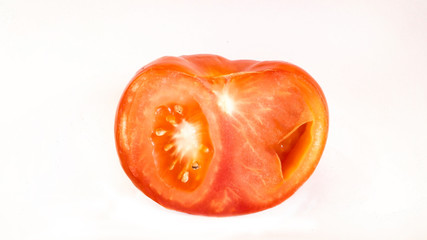 half of tomato isolated on  a white background