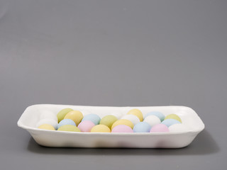 gift set of easter colored eggs on a white background