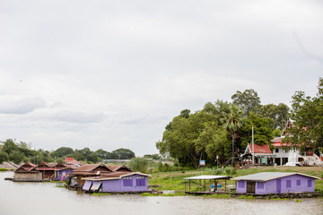 thai red house beside near river