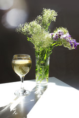 Beautiful purple violet spring flowers bouquet at home. Sunny summer composition. Blossom template for postcard.