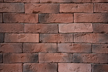 Background of a red brick wall. Old bricks close-up. Texture.