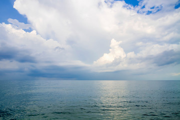 Clouds over the blue sea