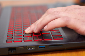 man hand are working on a laptop computer,working man on laptop computer at home, new professions...
