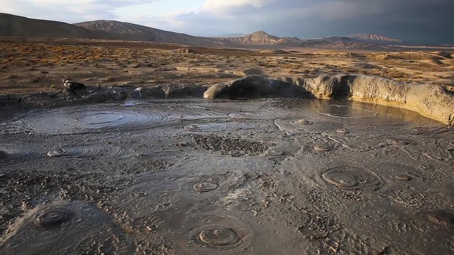 Mud volcanoes of Gobustan near Baku, Azerbaijan, Bubbling crater of a mud volcano