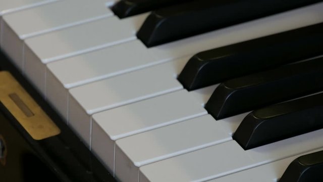 An interesting mystical self-playing piano. Black and white piano keys that play on their own
