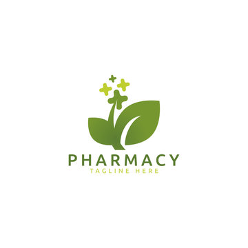 pharmacy logo vector graphic with cross and leaves image for any business especially for healthcare and medical.